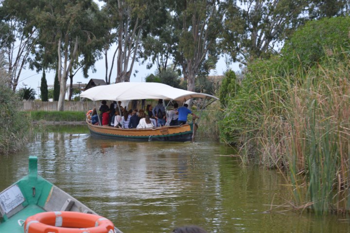 a small boat in a body of water